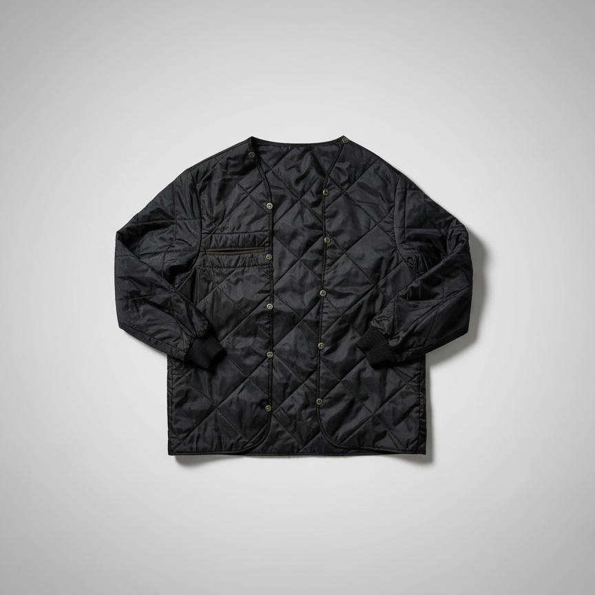 Black quilted jacket on a light gray background