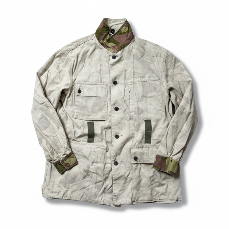 Light-colored jacket with camouflage accents on a white background